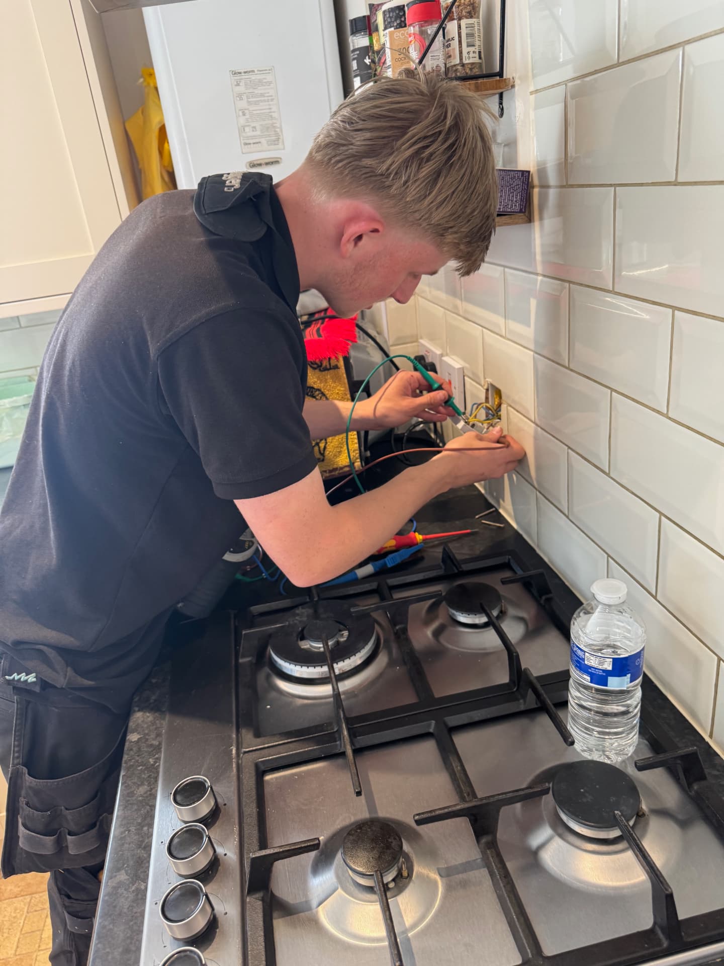 Swiss Electrical on the job — socket testing in a kitchen